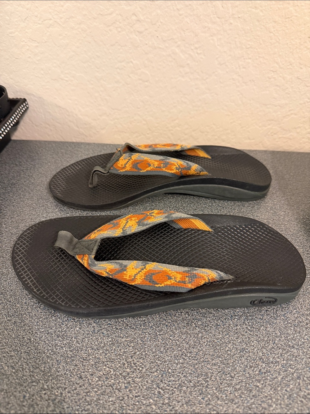 Chaco Black Flip Flop Sandals with Orange Patterned Straps